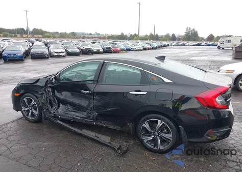 2016 Honda Civic Touring from USA, damaged, VIN 2HGFC1F93GH649022